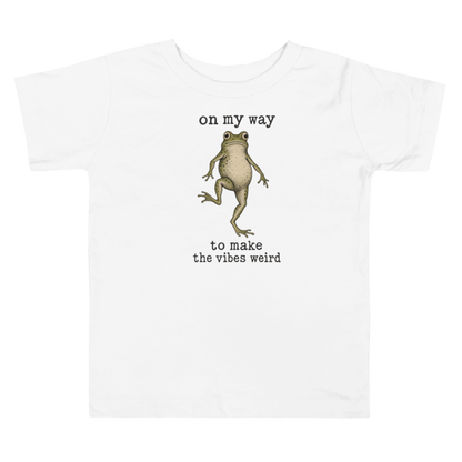 On My Way to Make the Vibes Weird Toddler T-Shirt in White, front