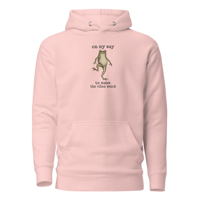 On My Way to Make the Vibes Weird Hoodie in Light Pink, front